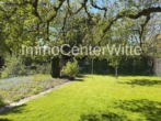 Im Garten - Viel Raum für Ihr Familienleben – Einfamilienhaus mit Wintergarten und Garage in 25348 Glückstadt